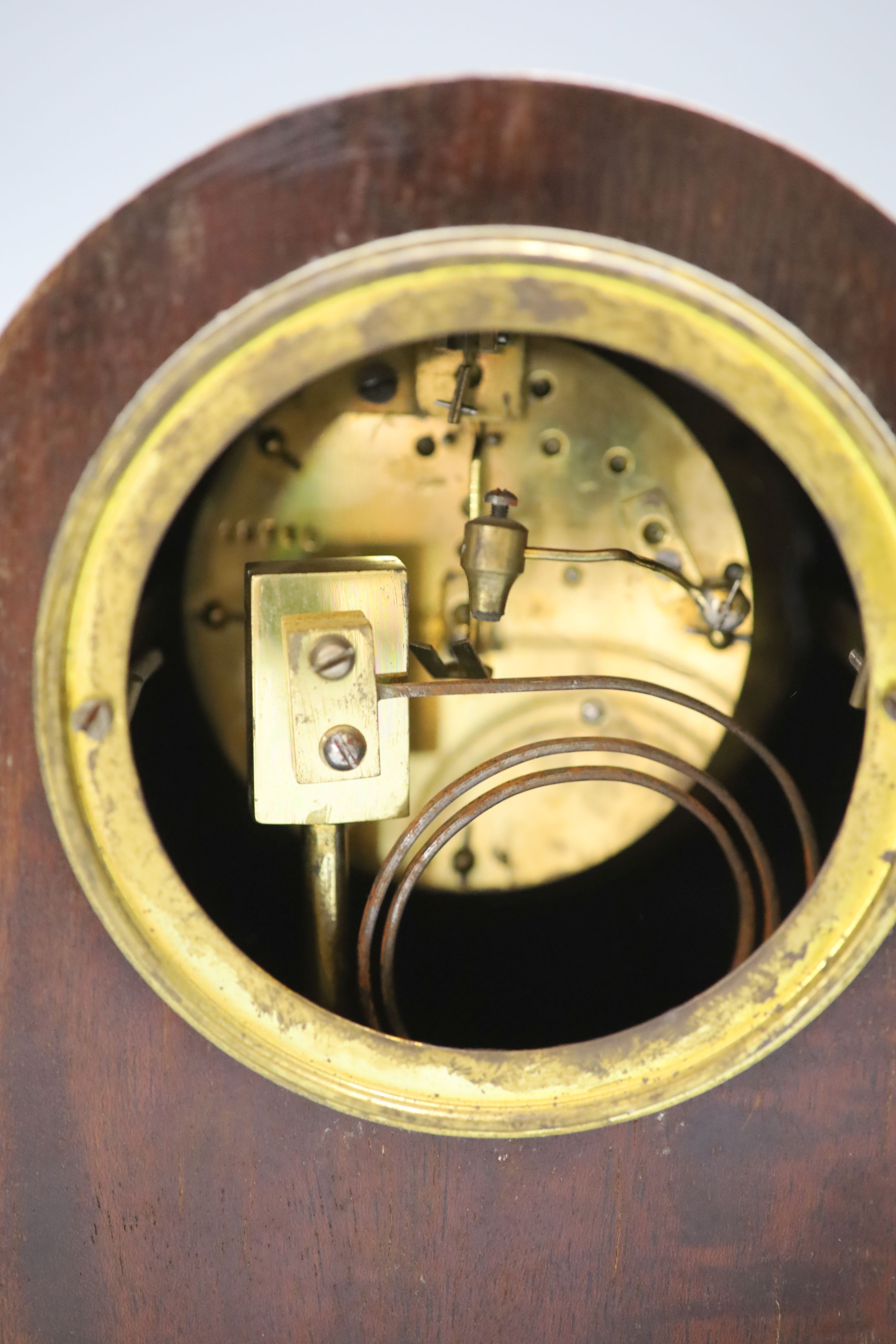 A French mahogany mantel clock, height 21.5cm